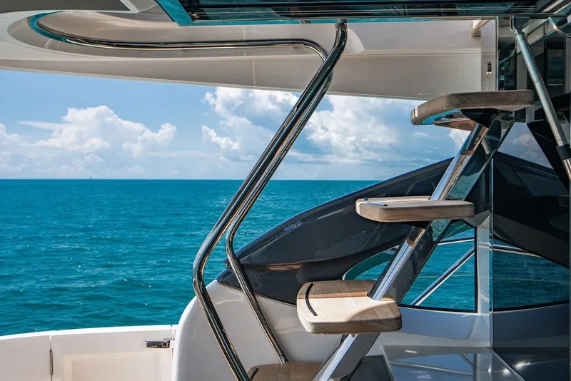 Slide: The Image of Luxurious 2021 Princess S62 yacht staircase with ocean view. - 16