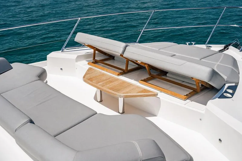 Slide: The Image of Luxury sunbathing area on 2021 Princess S62 yacht with adjustable loungers. - 35