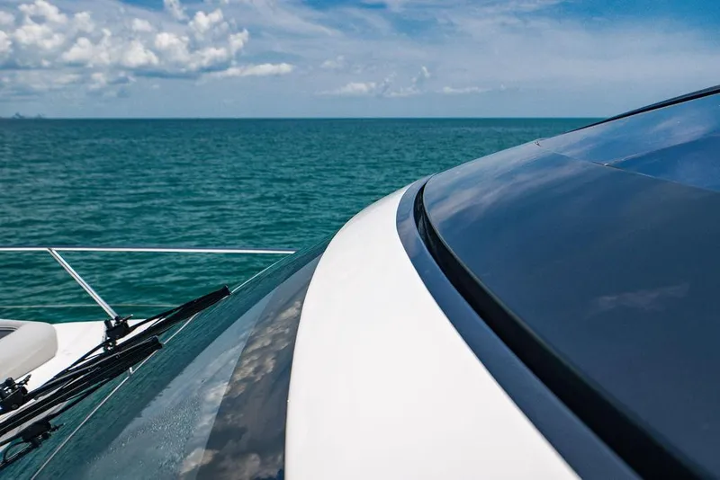 Slide: The Image of Luxury Princess S62 yacht on open sea, 2021 model, clear skies, and calm waters. - 37