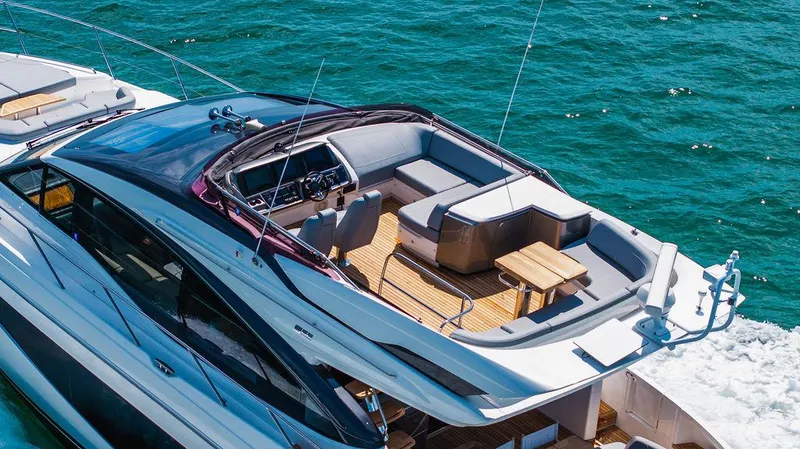 Slide: The Image of Luxury Princess S62 yacht cruising on blue ocean waters, 2021 model. - 4