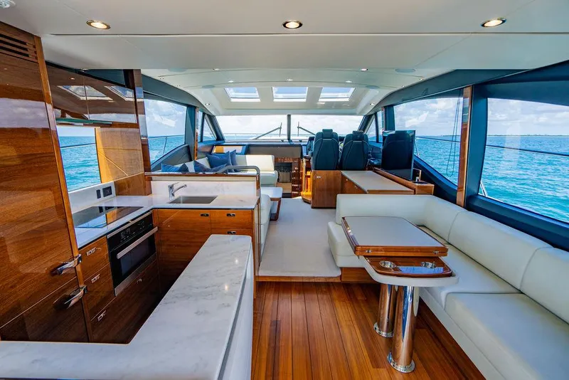 Slide: The Image of Luxurious interior of 2021 Princess S62 yacht with modern kitchen and seating area. - 40