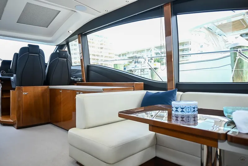 Slide: The Image of Luxurious interior of 2021 Princess S62 yacht with elegant seating and large windows. - 44
