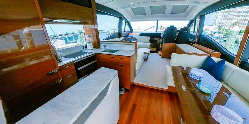 Slide: The Image of Luxurious interior of 2021 Princess S62 yacht with modern kitchen and seating area. - 45