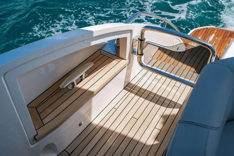 Slide: The Image of Luxury Princess S62 yacht deck with teak flooring, 2021 model, overlooking ocean waves. - 8
