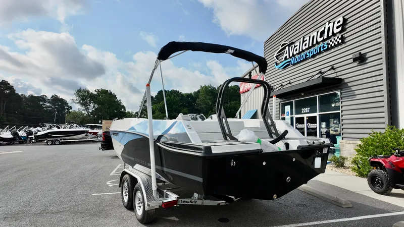 Slide: The Image of 2026 Starcraft SVX 211 OB boat at Avalanche Motorsports dealership. - 5