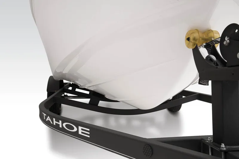 Slide: The Image of 2023 Tahoe T18 boat on trailer, close-up view of hull and hitch. - 23