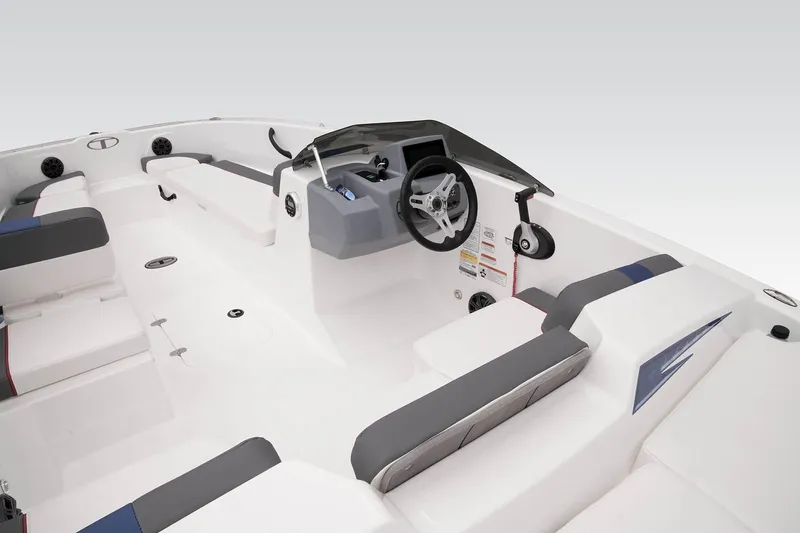 Slide: The Image of 2023 Tahoe T18 boat interior with modern seating and steering console. - 37