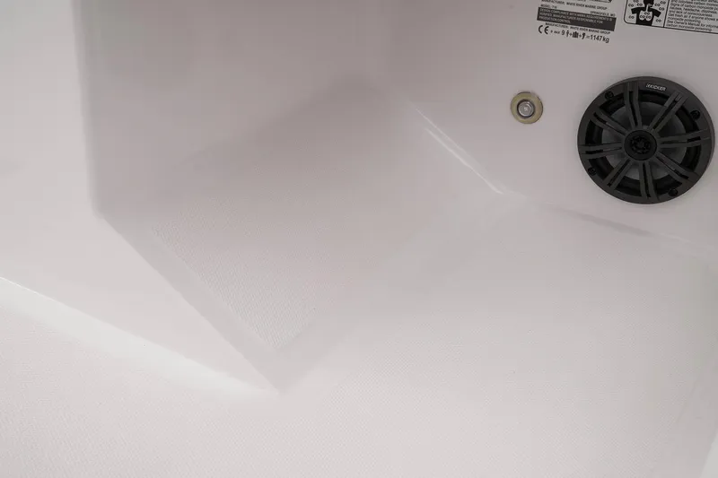 Slide: The Image of 2023 Tahoe T18 interior detail with speaker and textured surface. - 42