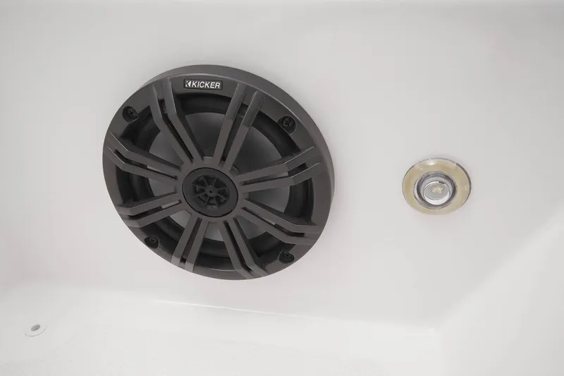 Slide: The Image of 2023 Tahoe T18 boat speaker and drain plug on white surface. - 43