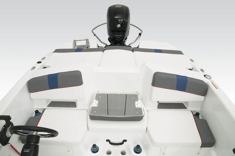 Slide: The Image of 2023 Tahoe T18 boat interior with seating and steering wheel, featuring modern design elements. - 46