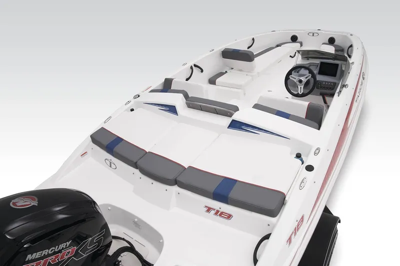 Slide: The Image of 2023 Tahoe T18 boat interior with seating and Mercury engine. - 48