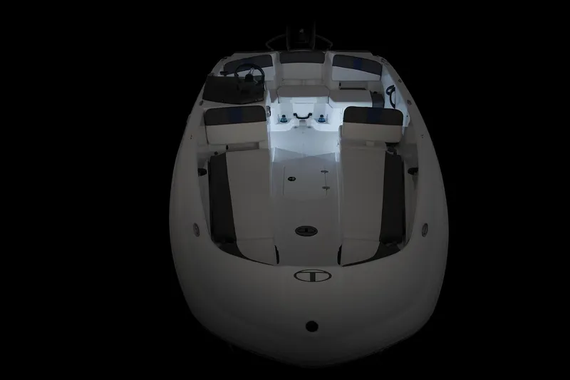 Slide: The Image of 2023 Tahoe T18 boat interior with illuminated seating and sleek design. - 55