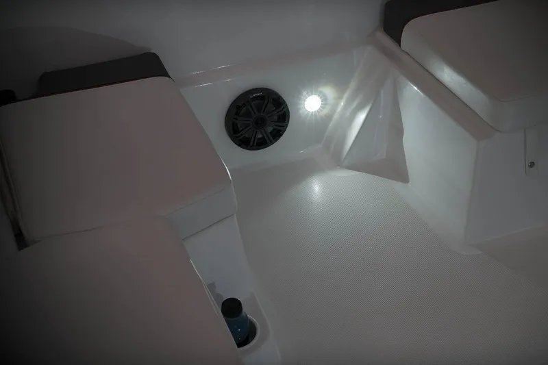 Slide: The Image of 2023 Tahoe T18 boat interior with seating, speaker, and lighting. - 57