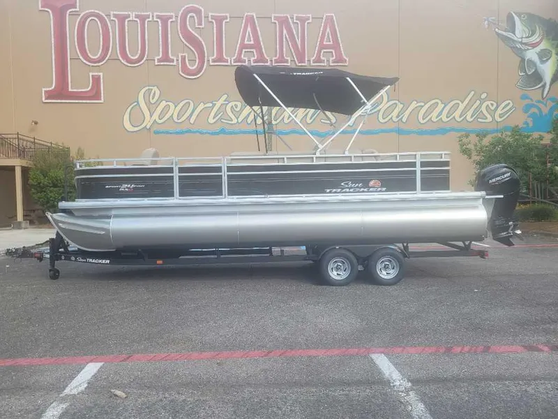 The Image of 2025 Sun Tracker Sportfish 24 XP3 pontoon boat parked at Louisiana Sportsman's Paradise. - 0