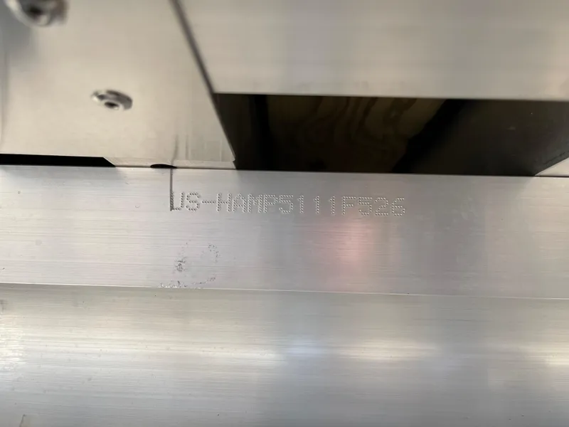 Slide: The Image of VIN number engraved on a 2026 Harris Solstice 230 boat hull. - 21