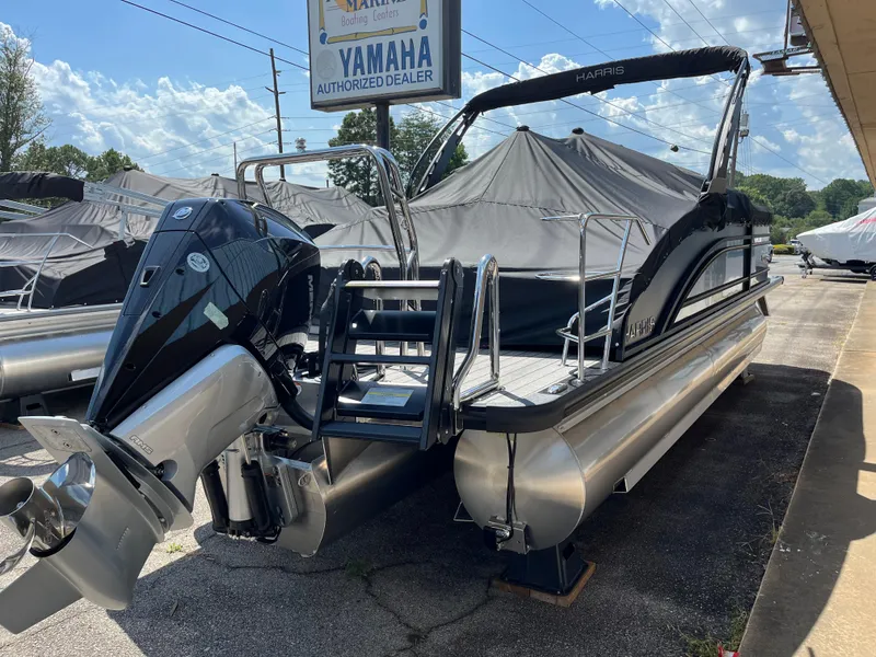 Slide: The Image of 2026 Harris Solstice 230 pontoon boat with Yamaha engine at dealership. - 4