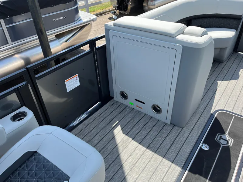 Slide: The Image of 2026 Harris Solstice 230 boat interior with gray seating and modern design. - 8