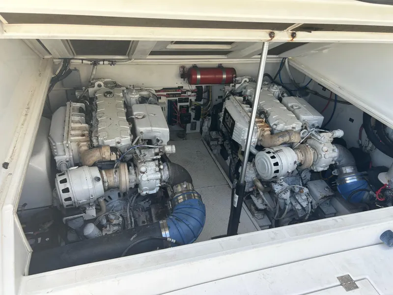 Slide: The Image of Engine room of a 2006 Rampage EXPRESS boat with dual engines. - 22