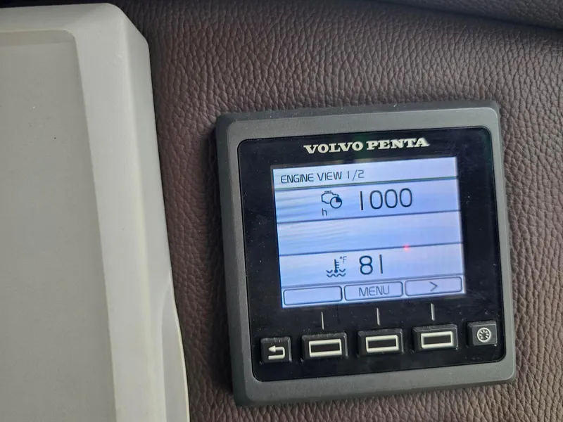 Slide: The Image of Volvo Penta engine display on 2014 Ranger Tugs 31-CB, showing 1000 hours and 81°F. - 21