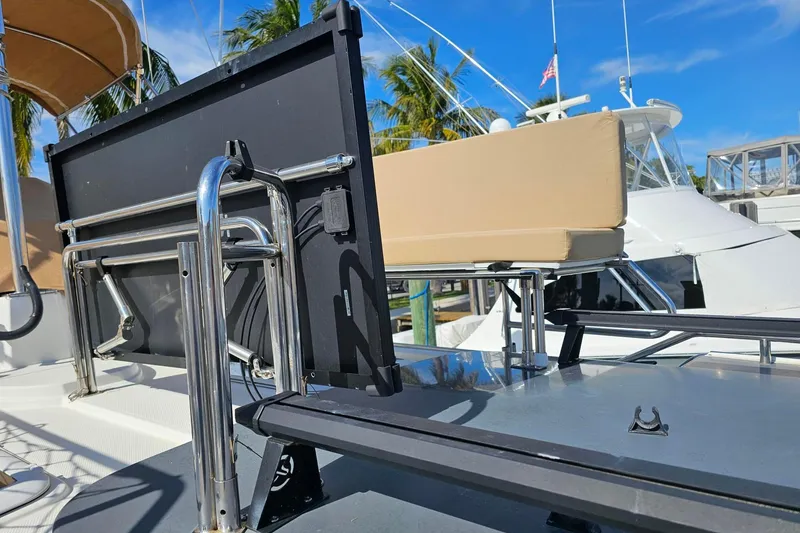 Slide: The Image of 2014 Ranger Tugs R 31 boat with foldable seating and stainless steel railings. - 29