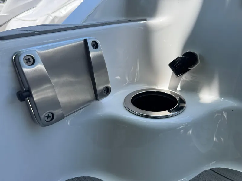 Slide: The Image of Close-up of 2025 Yamaha AR250 boat's stainless steel and plastic fittings. - 33