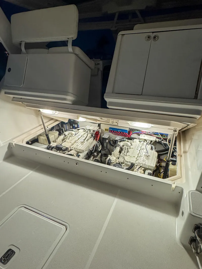 Slide: The Image of Engine compartment of a 2006 Tiara Yachts 3200 Open, showcasing dual engines. - 19