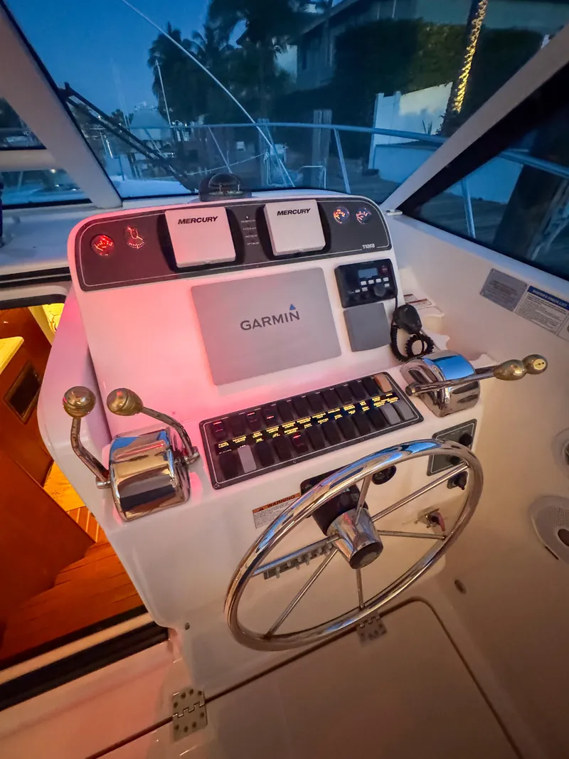 Slide: The Image of Helm of 2006 Tiara Yachts 3200 Open with Garmin navigation system. - 37