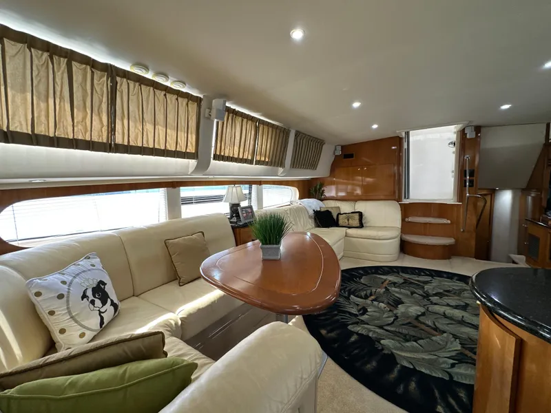 Slide: The Image of Luxurious interior of a 2002 Carver 466 Motor Yacht with elegant seating and decor. - 16