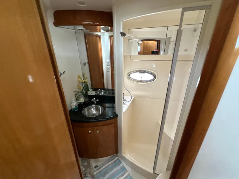 Slide: The Image of Bathroom interior of 2002 Carver 466 Motor Yacht with sink and shower. - 25