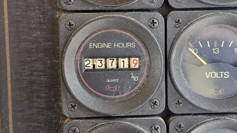 Slide: The Image of Close-up of engine hour meter showing 23719 hours on a 1988 Bluewater Yachts 55 Coastal Cruiser. - 35