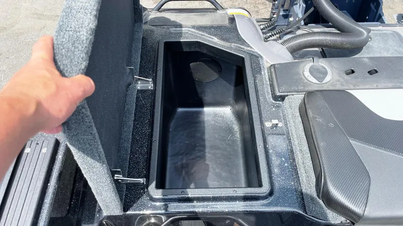 Slide: The Image of Open storage compartment in 2025 Skeeter WXR 2060 boat, showcasing interior space. - 8