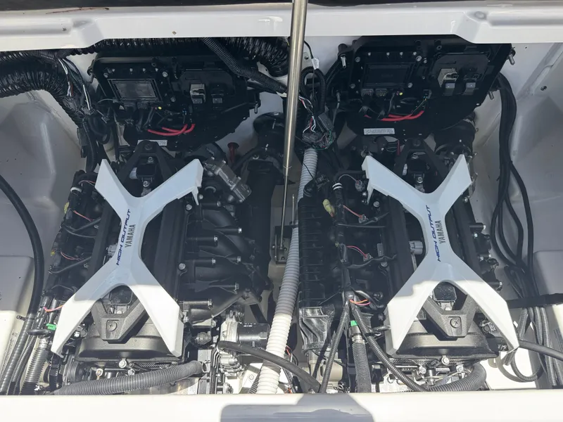 Slide: The Image of 2025 Yamaha AR250 boat engine compartment with dual high-output engines. - 29
