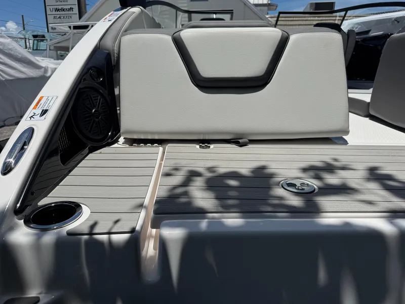 Slide: The Image of 2025 Yamaha Boats AR250 interior with sleek seating and modern design elements. - 32