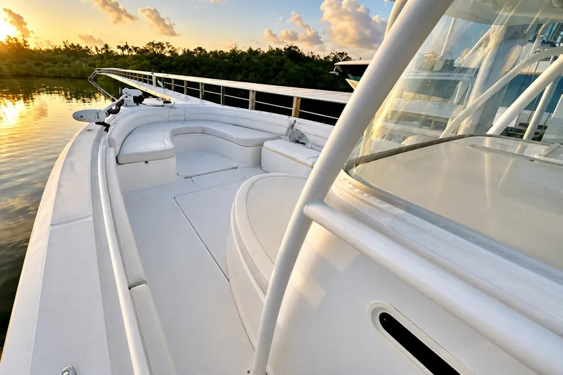 Slide: The Image of 2017 Stamas 390 Tarpon boat deck at sunset, featuring sleek design and comfortable seating. - 15