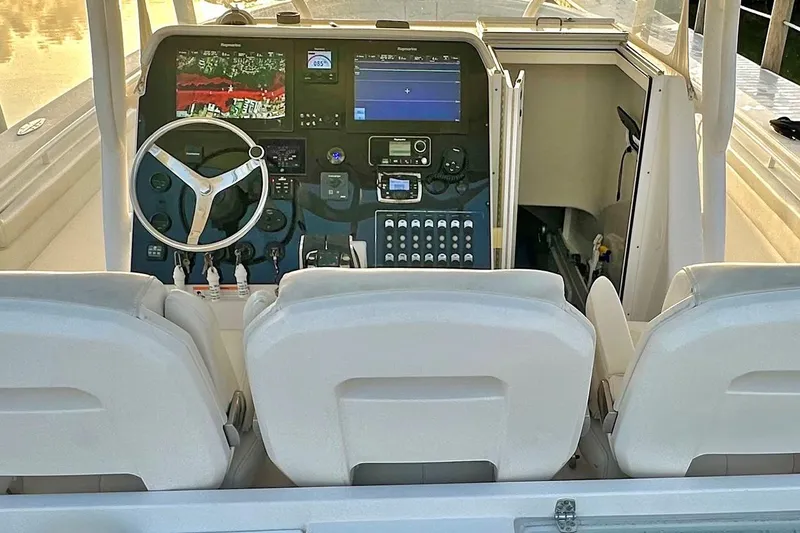 Slide: The Image of Open storage compartment on 2017 Stamas 390 Tarpon boat, showing interior details. - 7