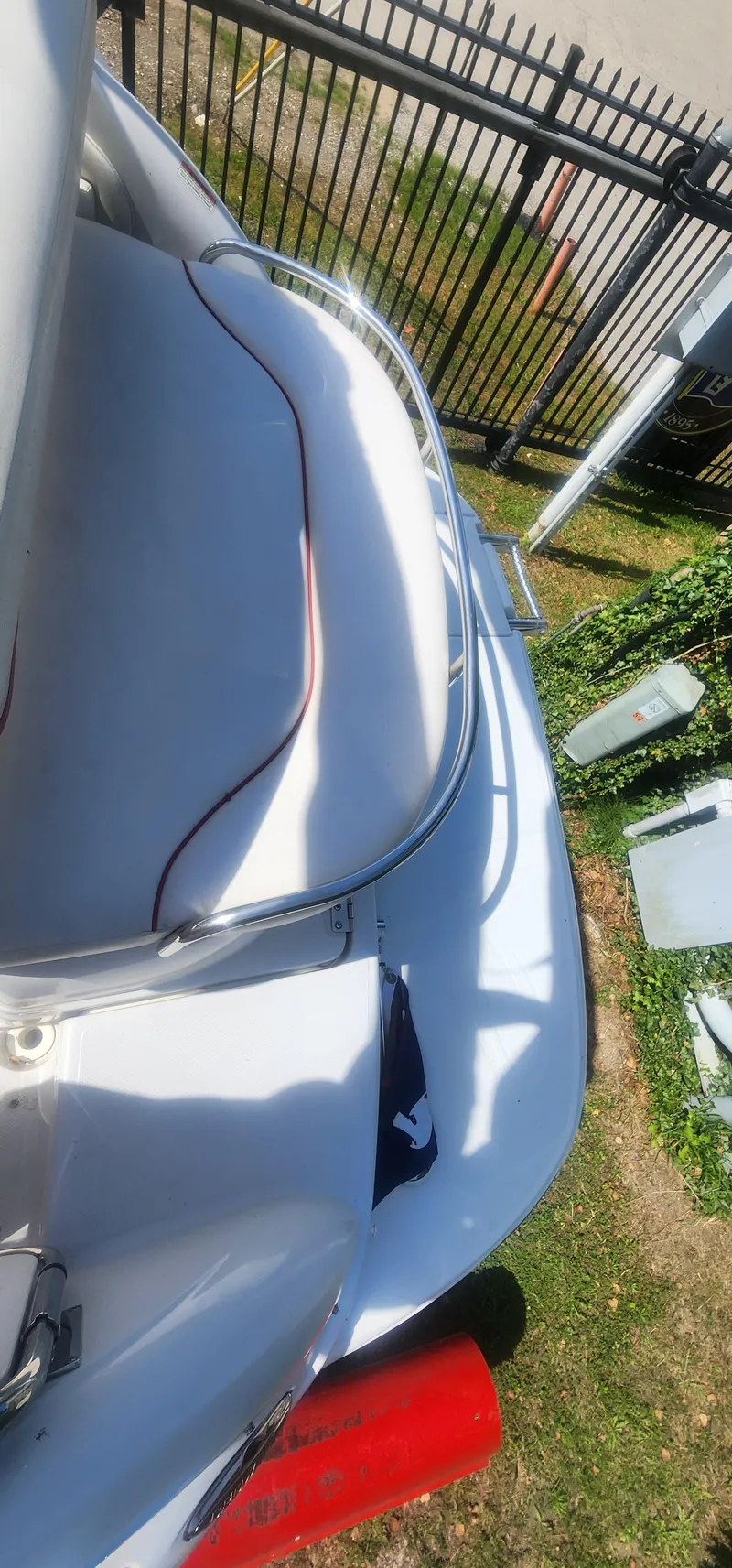 Slide: The Image of 2009 Crownline 250cr boat with white seating and railing, viewed from above. - 7