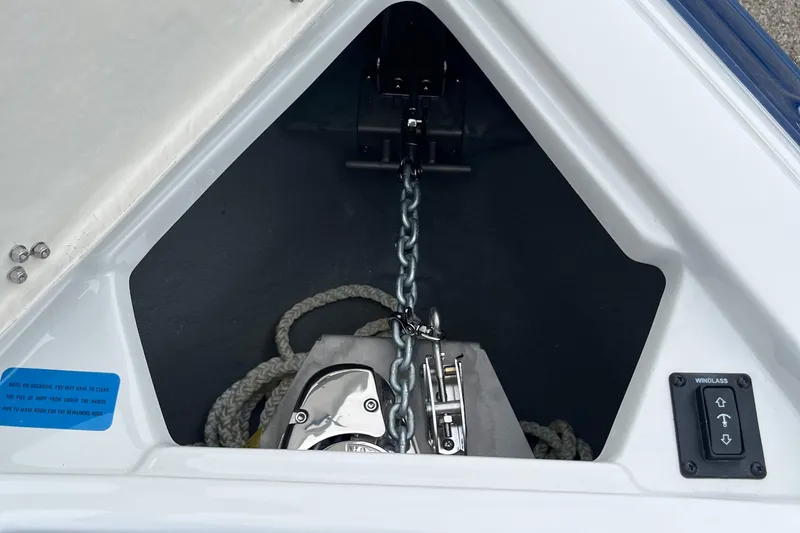 Slide: The Image of Anchor compartment of 2026 Crownline 270 SS boat with windlass control. - 4