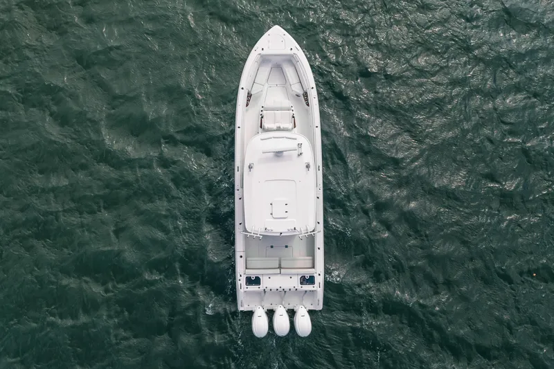 Slide: The Image of Aerial view of 2022 Everglades 395cc boat on open water. - 12