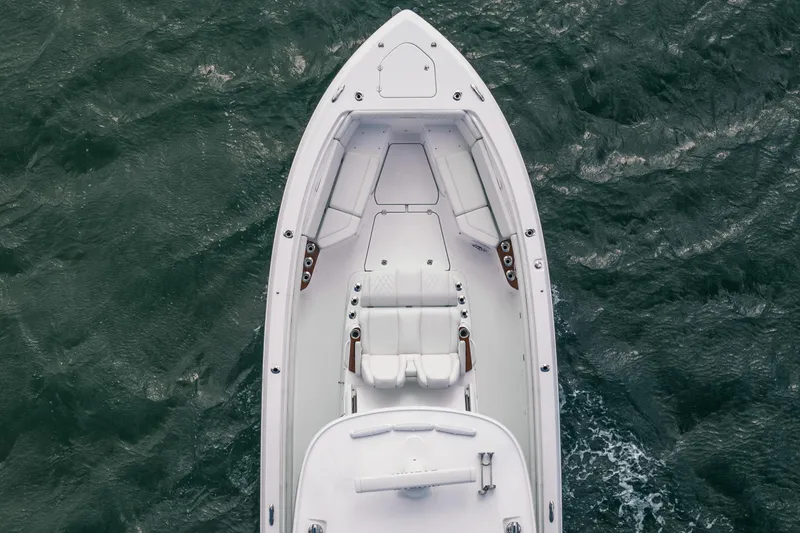 Slide: The Image of Top view of 2022 Everglades 395cc boat on water. - 13