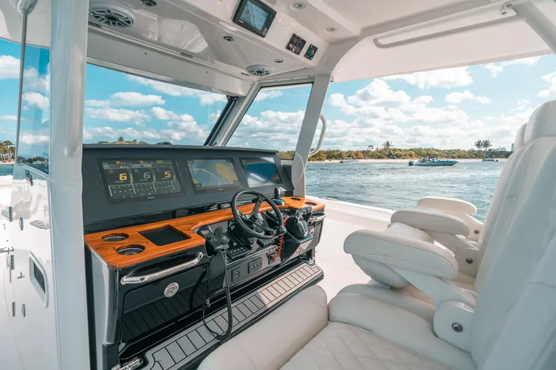 Slide: The Image of Luxury interior of 2022 Everglades 395cc boat with advanced navigation system. - 44