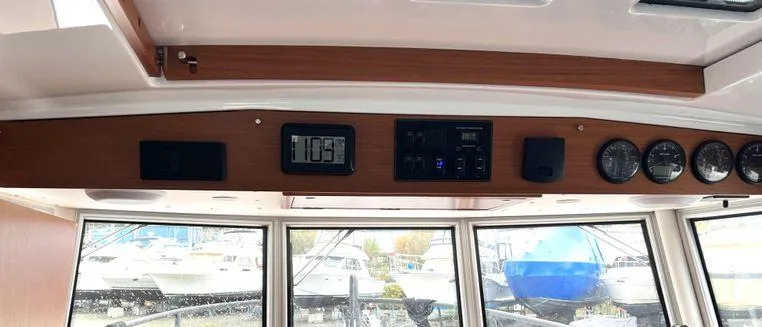 Slide: The Image of Interior dashboard of 2024 Sargo 36 boat with gauges and controls. - 31