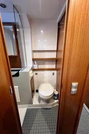 Slide: The Image of 2024 Sargo 36 yacht bathroom with modern fixtures and wooden accents. - 33