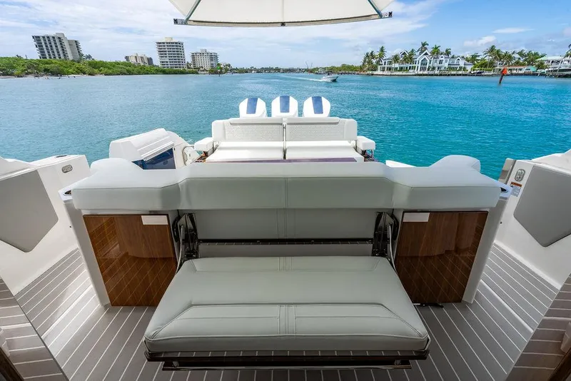 Slide: The Image of 2025 Tiara Yachts 48 LS luxury yacht interior with scenic waterfront view. - 20