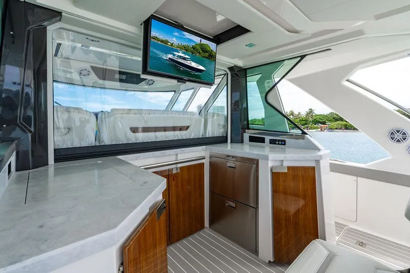 Slide: The Image of Luxurious interior of 2025 Tiara Yachts 48 LS with modern amenities and scenic view. - 23