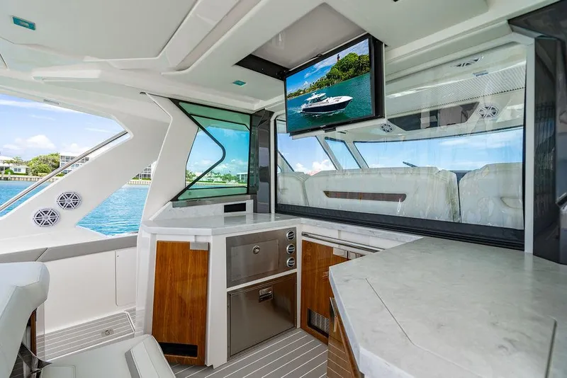 Slide: The Image of Luxurious interior of 2025 Tiara Yachts 48 LS with modern amenities and scenic view. - 27