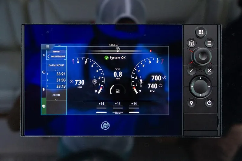 Slide: The Image of Dashboard display of 2025 Tiara Yachts 48 LS showing engine metrics and system status. - 35