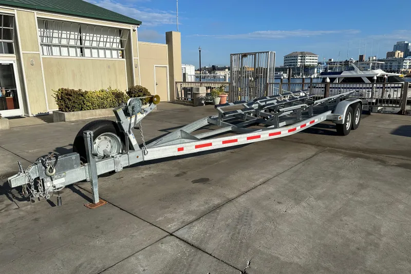Slide: The Image of Boat trailer for 2015 Duckworth 26’ Offshore, parked near marina. - 20