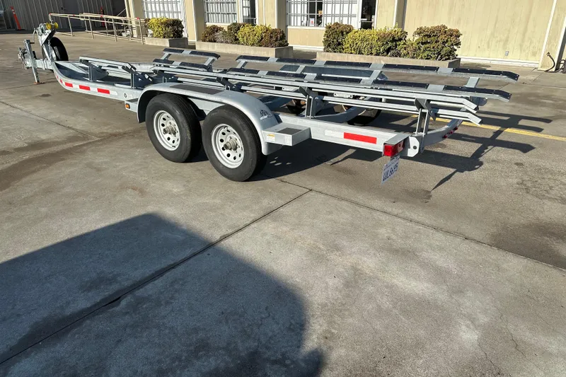 Slide: The Image of Trailer for 2015 Duckworth 26’ Offshore boat parked on concrete surface. - 22