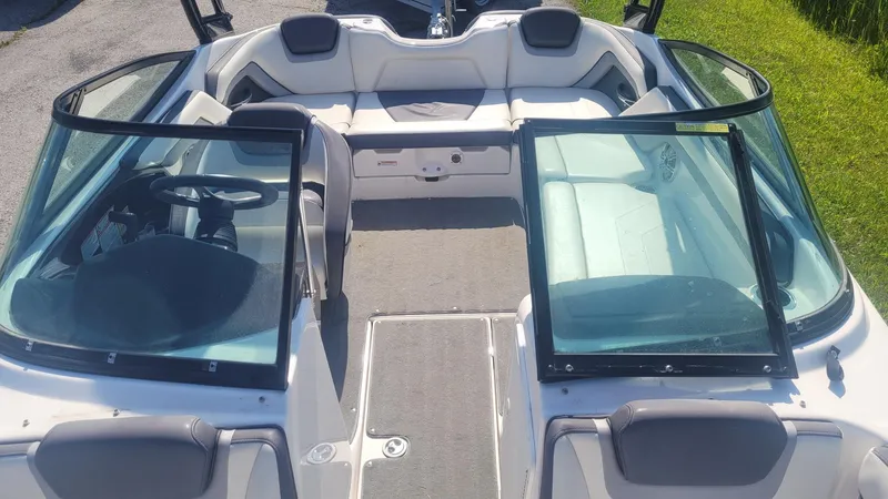 Slide: The Image of 2016 Yamaha AR192 boat interior with seating and steering wheel, viewed from above. - 10