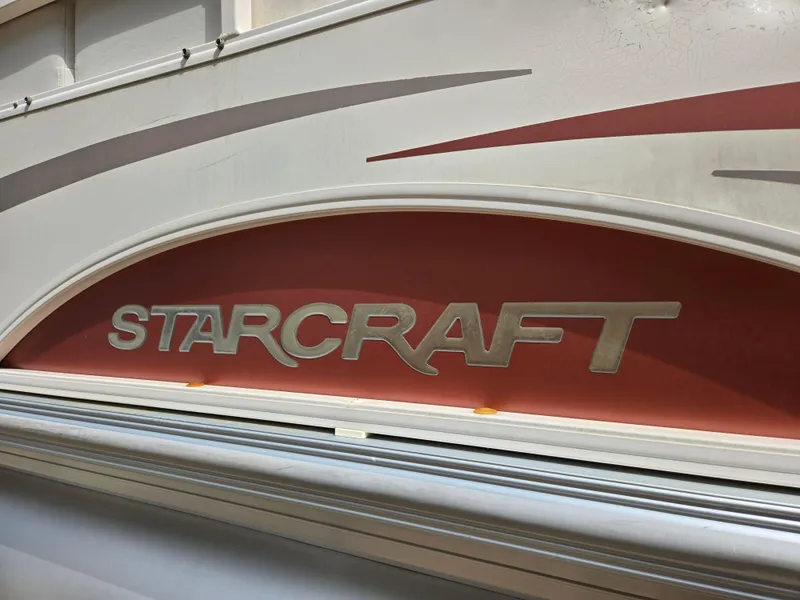 Slide: The Image of 2008 Starcraft Elite 226 RE CR logo on vehicle exterior. - 12